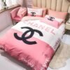 Chanel logo pink and white printed bedding sets quilt sets duvet cover luxury brand bedding decor bedroom sets best luxury bed sets gift thankgivings and christmas Bedding Sets